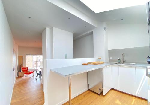 Cuisine ou kitchenette dans l'établissement Tour d'Auvergne - Appartements en plein centre ville, proche de la cathédrale et de la place de Jaude