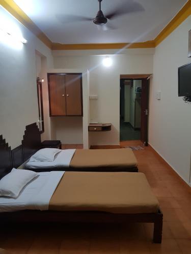 Кровать или кровати в номере The Sincro Hotel