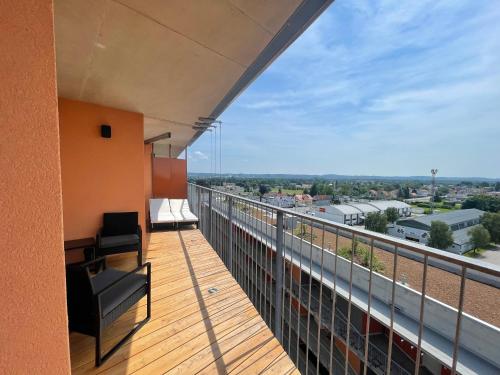 a balcony with a view of a city at 100 qm Penthouse, Self-Check-In, 2 Parkplätze in Graz