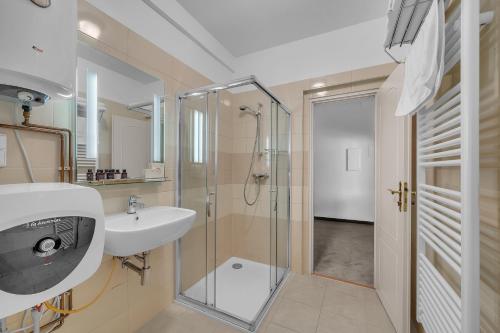Koupelna v ubytování Hotel Nelly Kellys