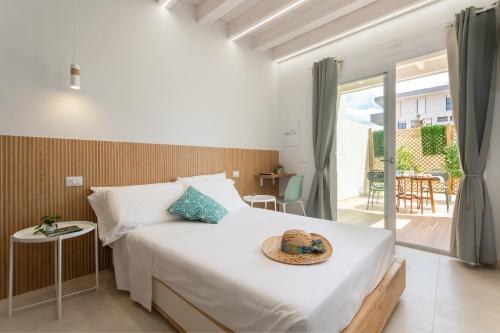 Posteľ alebo postele v izbe v ubytovaní Domus Laetitiae Rooms & Apartments