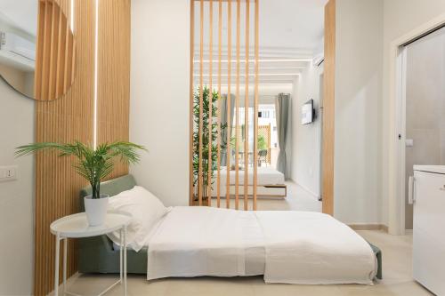 Katil atau katil-katil dalam bilik di Domus Laetitiae Rooms & Apartments