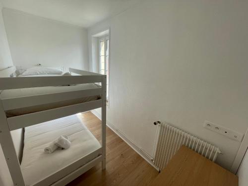 Ένα ή περισσότερα κρεβάτια σε δωμάτιο στο Gesse, Maison avec terrasse