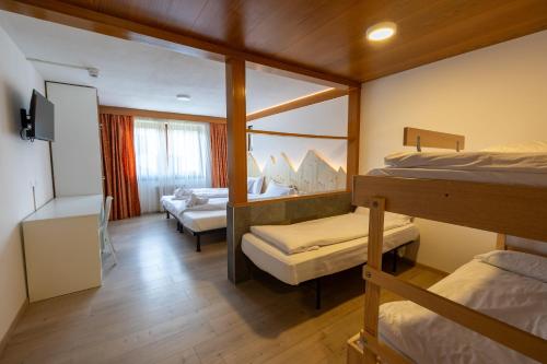 Katil atau katil-katil dalam bilik di Hotel Villaggio Nevada