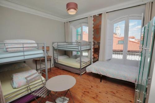 Katil atau katil-katil dalam bilik di ThePlacetoBe B&B