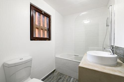 a bathroom with a toilet and a sink and a tub at San Lameer Villa 1914 - 2 Bedroom Standard - 4 pax - San Lameer Rental Agency in Southbroom