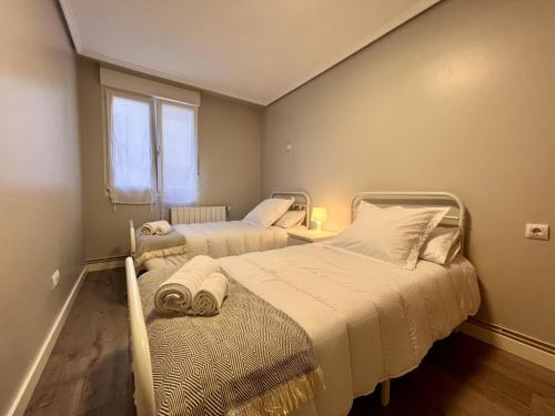 Postel nebo postele na pokoji v ubytování Apartamento Parola