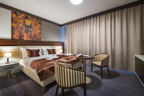 Postel nebo postele na pokoji v ubytování Boutique Hotel Villa ZAUBER