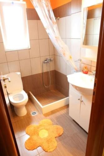 Ванная комната в Villas Kavouri 1