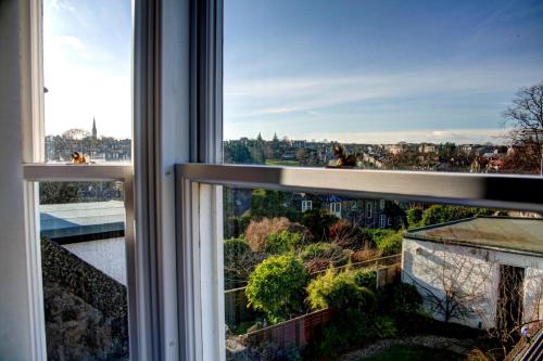 a view of a city from a window at Atticus Central Guest House in Aberdeen