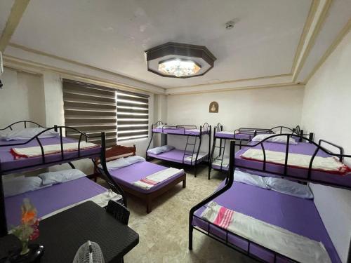 Postel nebo postele na pokoji v ubytování Chelsiefaye GuestHouse