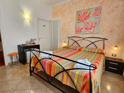 Postel nebo postele na pokoji v ubytování Guest house Il Giardino in Città