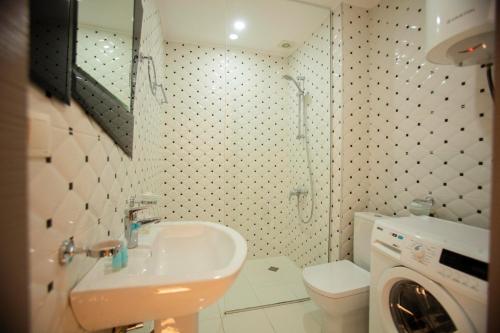 Ένα μπάνιο στο Aparthotel Holiday Lux Batumi