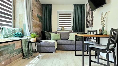 Posedenie v ubytovaní Apartament Słoneczne Okno