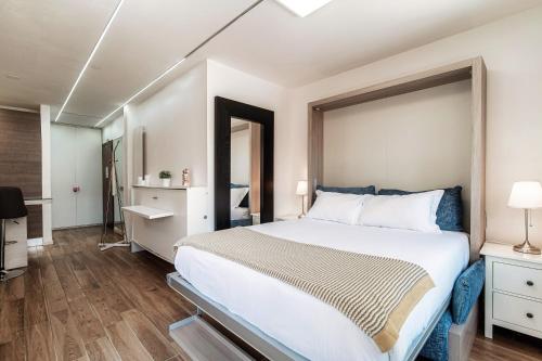 A bed or beds in a room at Terrazza Paradiso 2 by Quokka 360 - Studio with Balcony