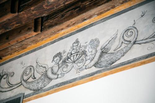 a drawing of birds on a wall at Palazzo dei Mori in Venice