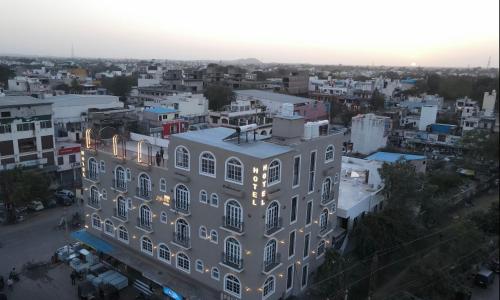 an overhead view of a building in a city at Hari Leela fort view palace in Chittaurgarh