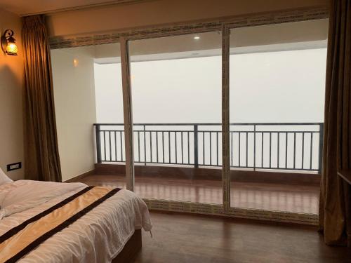Postel nebo postele na pokoji v ubytování Deolo Mist - A Boutique Mountain Hotel