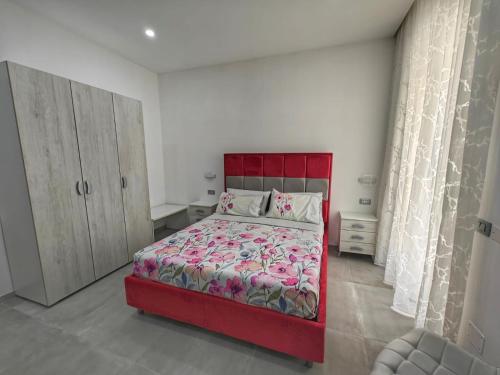 Letto o letti in una camera di Sotto Castello Living Room