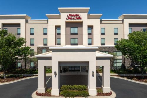 a rendering of the front of a hotel at Hampton Inn & Suites Huntsville Research Park Area in Huntsville