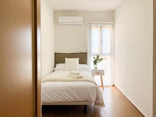 Postel nebo postele na pokoji v ubytování FuensalidaHomes101