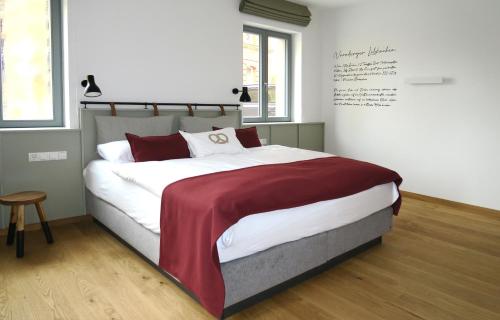 Postel nebo postele na pokoji v ubytování Gästehaus Gräf Haus
