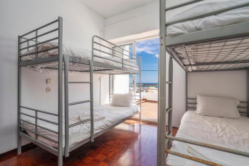 Postel nebo postele na pokoji v ubytování Sundance Beach House