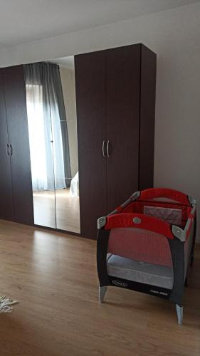 a bedroom with a bed and a mirror at Casa D&C in Avigliano