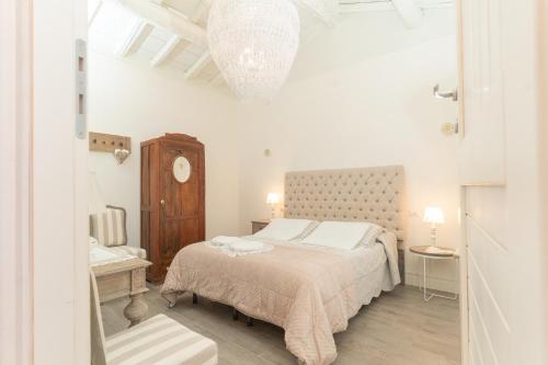 Postel nebo postele na pokoji v ubytování B&B Il Fosso Bianco