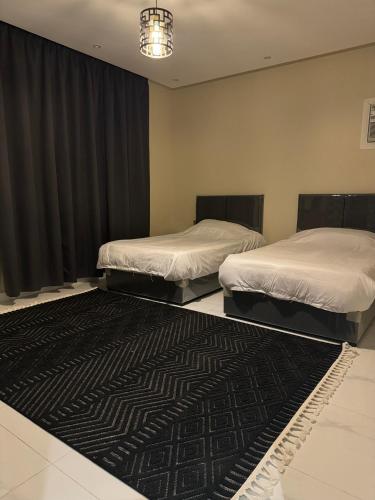 Postel nebo postele na pokoji v ubytování جولدن