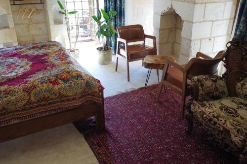 Katil atau katil-katil dalam bilik di Hercai Butik Otel