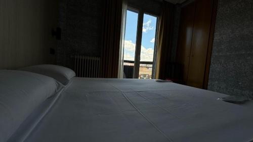 Ένα ή περισσότερα κρεβάτια σε δωμάτιο στο Hotel Madrid Río