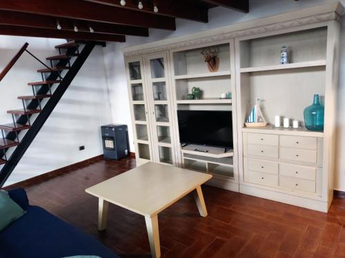 TV a/nebo společenská místnost v ubytování Casa Iraida Tao