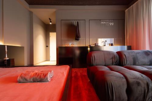 a living room with two couches and a couch at ETERN Apart-Hotel II in Pristina