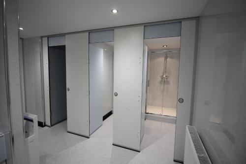 a row of glass doors in a building at The Lodges in Stanley