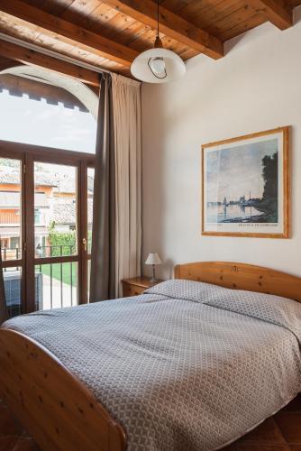 Ένα ή περισσότερα κρεβάτια σε δωμάτιο στο Agriturismo La Filanda