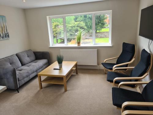 Χώρος καθιστικού στο Cosy Ensuite Double Room