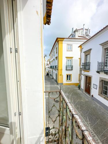 a view from a balcony of a street at Largo Inn Suites Evora in Évora