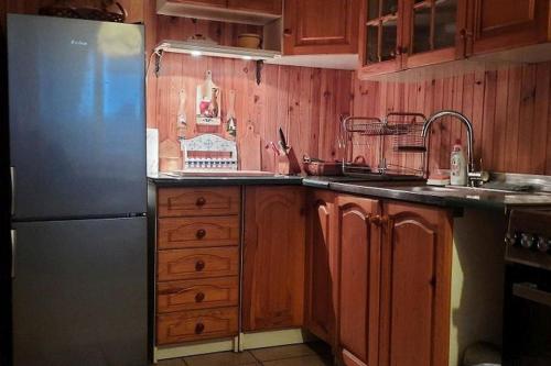 Η κουζίνα ή μικρή κουζίνα στο Urokliwy domek blisko jeziora Żarnowieckiego, Nadole