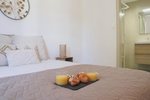 Ένα ή περισσότερα κρεβάτια σε δωμάτιο στο La Chambre Chamane