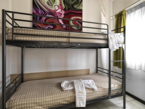 Ένα ή περισσότερα κρεβάτια σε δωμάτιο στο Elia Apartments