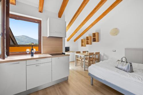 A bed or beds in a room at Residence Lagorai