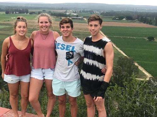 a group of people standing on top of a hill at Avoca River Cabins in Addo