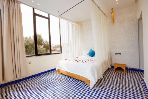 Postel nebo postele na pokoji v ubytování Palais Shazam & SPA