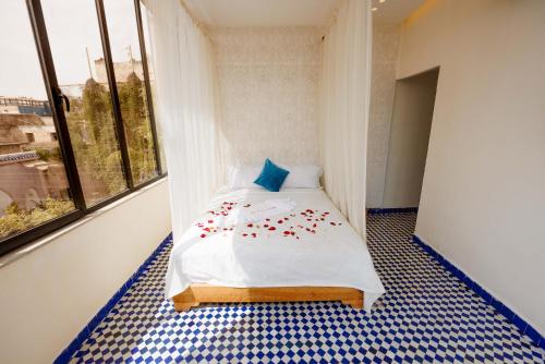 Postel nebo postele na pokoji v ubytování Palais Shazam & SPA