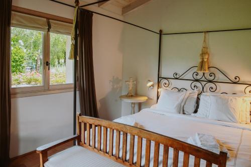 Postel nebo postele na pokoji v ubytování Relais de Charme le Videlle