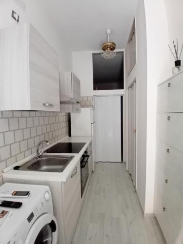 Kuchyň nebo kuchyňský kout v ubytování AS House