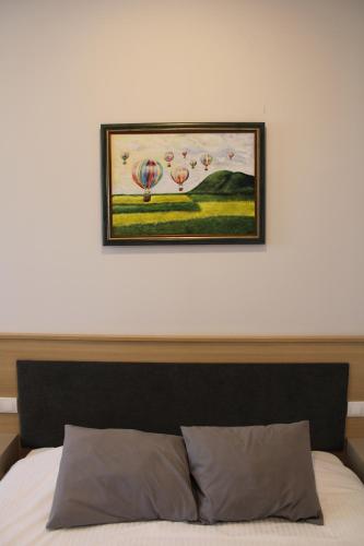 Postel nebo postele na pokoji v ubytování MD Apartmants