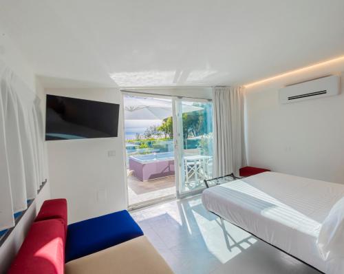 Postel nebo postele na pokoji v ubytování Aquamaris Design Suite & Spa