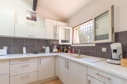 Køkken eller tekøkken på Appartement - Portes Des Calanques